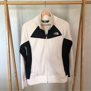 THE NORTH FACE CREAM AND BLACK MEDIUM WEIGHT JACKET. SIZE MEDIUM.